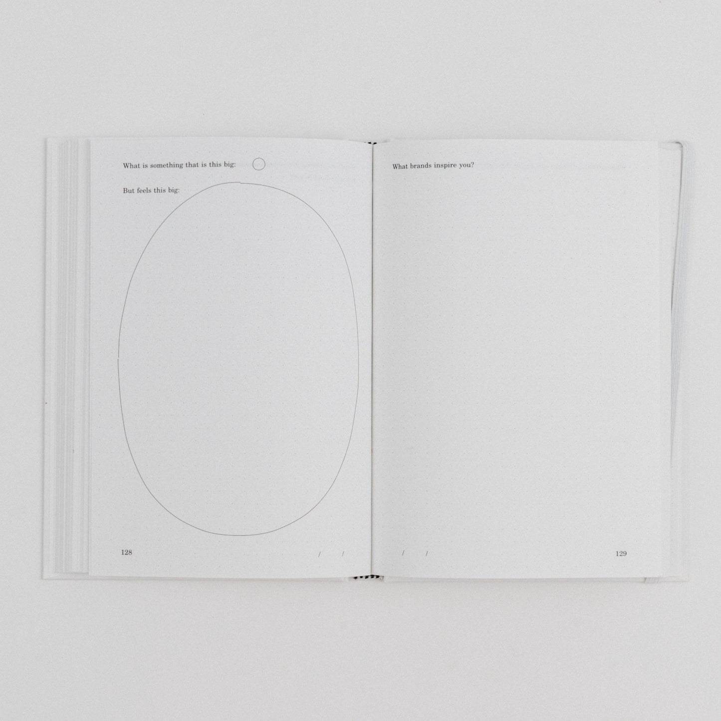 Page 128 and 129 of No Particular Order:Vol 1 read "What is this big *small circle* but feels this big *large circle*" and "what brands inspire you?"